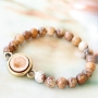 Schmuck mit einem nat&uuml;rlichen Look mit u.a. Holz Cabochons in einzigartigen Designs!